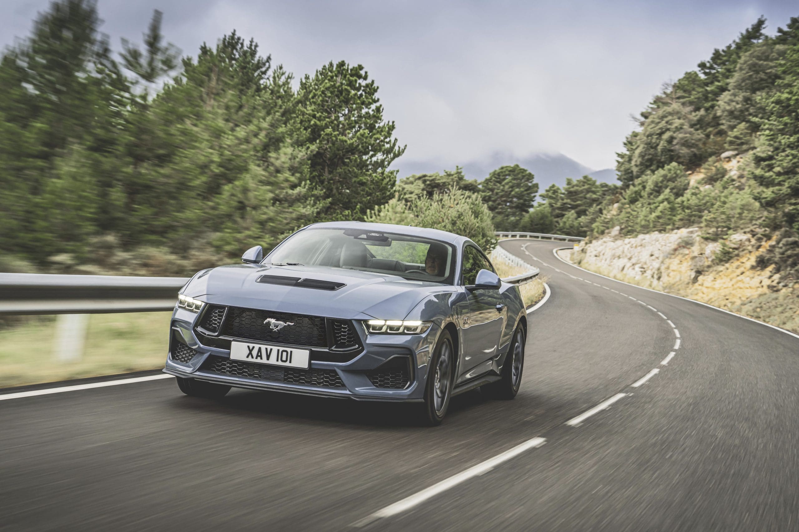 Ford Mustang S650 coupe on a twisty road